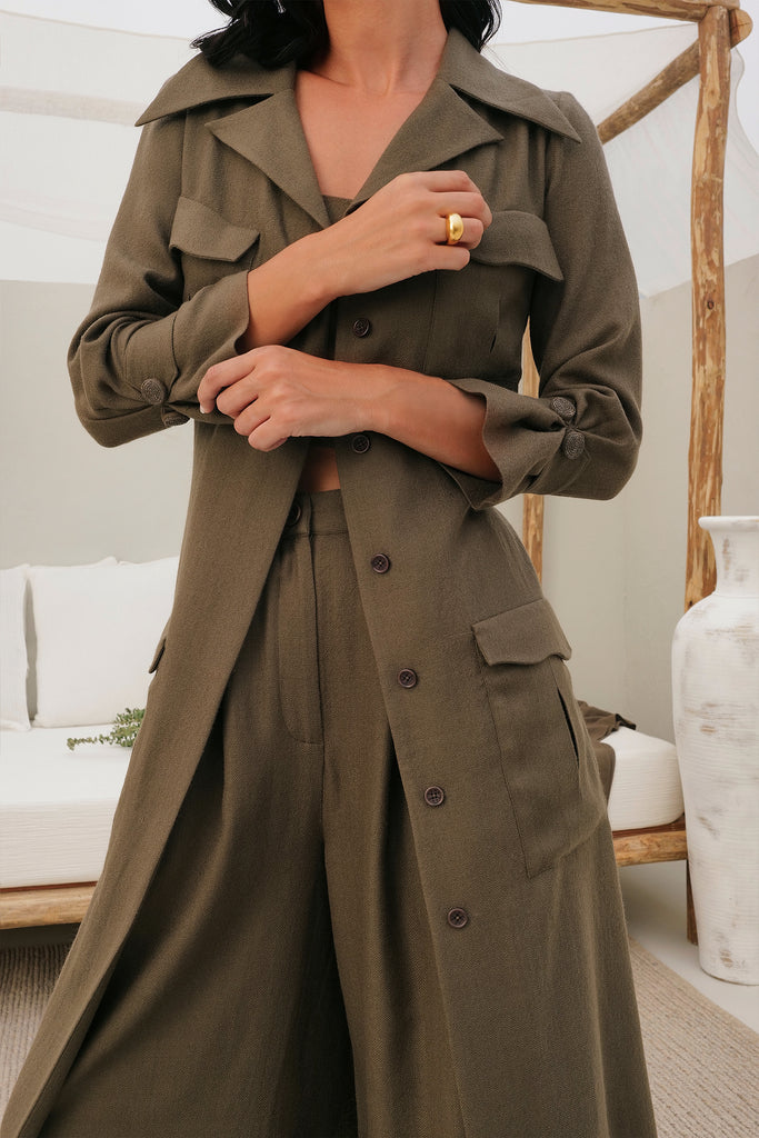 Taupe Midi Length Soft Herringbone Wool Trench With Exaggerated Collars, Scrunched Cuffs, Back Slit And A Waist Belt