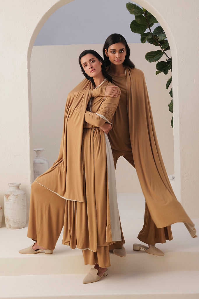Sand Color Jumpsuit Ankle To Long Length With A Narrow Round Neck, And Long Sleeves 